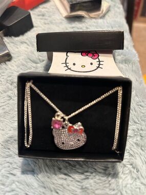 Hello Kitty Silver-Tone Crystal Face Necklace with Pink & Red Bows